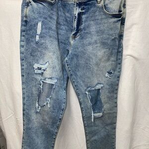 Distressed Blue Denim Jeans